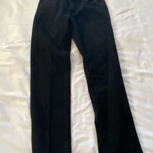 Black Slim Jeans with a sleek design and full-length fit